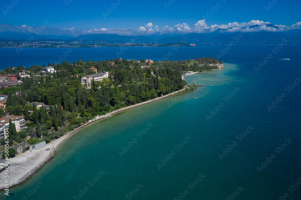 Morning photography with drone. Archaeological site of Grotte di Catullo, Sirmione, Italy early morning aerial view. lake garda. Tourist destination in Lombardy region of Italy