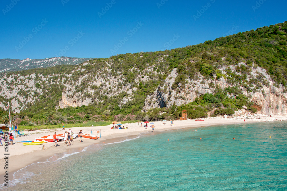Cala Luna beach with white sand and the famous caves in Cala Gonone, Sardinia, Italy Cala Luna beach with white sand and the famous caves in Cala Gonone, Sardinia, Italy