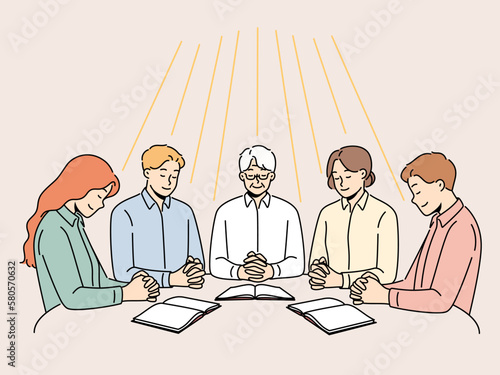 Group of diverse people sit at table praying together. Men and women engaged in prayer ask god for fate and fortune. Faith and religion. Vector illustration. 