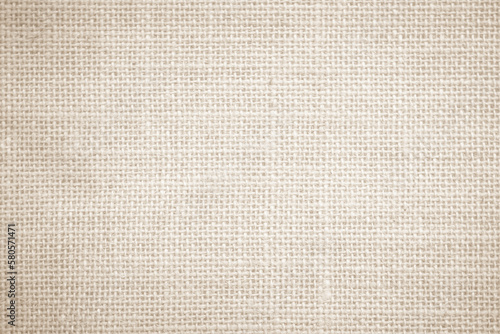 Jute hessian sackcloth burlap canvas woven, linen and cotton texture background pattern in light beige cream brown natural 