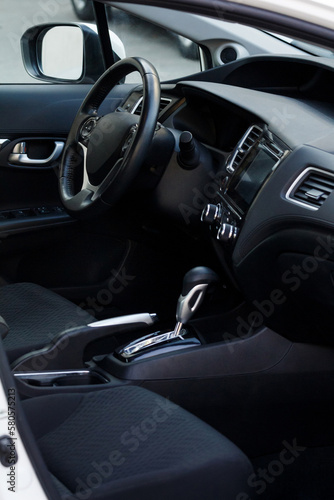 Modern car interior. Front passenger seat view © Andrey Myagkov