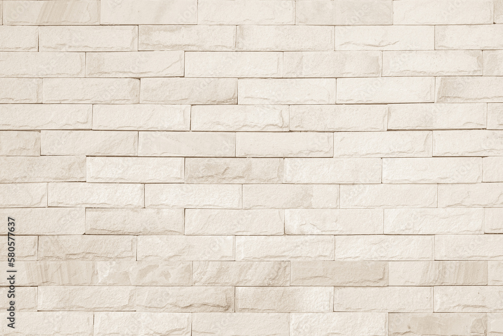 Naklejka premium Cream brick wall texture. Old brown brick wall concrete or stone pattern nature