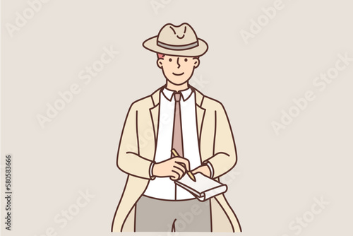 Male detective make notes in notebook 
