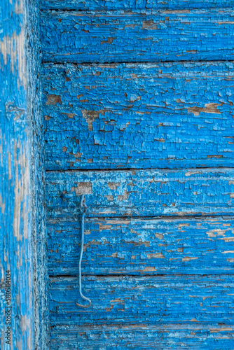 Wooden antique background blue color Wooden texture background. Facade of a wooden house