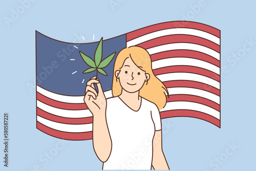 Smiling woman with cannabis on American flag background
