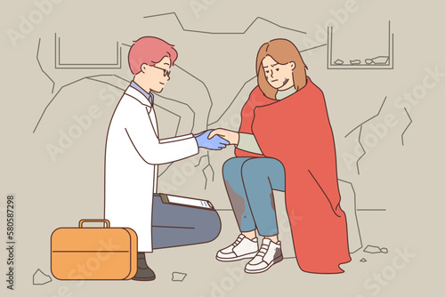 Male doctor help woman after natural disaster 