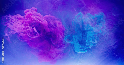 Color splash. Paint water. Ink drop. Bright pink blue vapor cloud floating on mist texture abstract art background with free space.