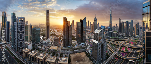 Dubai downtown district skyline at dramatic sunrise  United Arab Emirates - aerial view