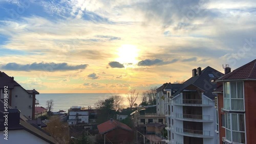 Sunset view on the Black Sea from the hotel building in Agoy. Tuapse, Russia. Bird's-eye view of the Black Sea. Modern hotels on the coast at sunset over the Black Sea. 4K photo