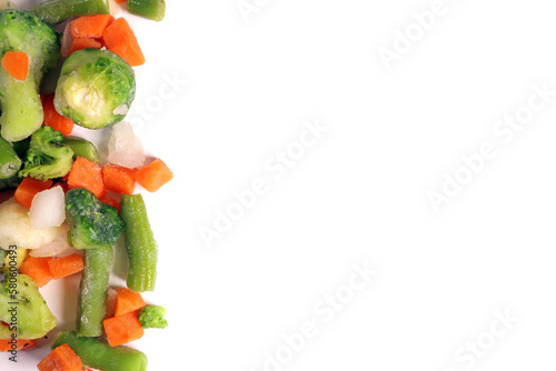 fresh frozen vegetables including broccoli, celera, onion, broccoli on white background