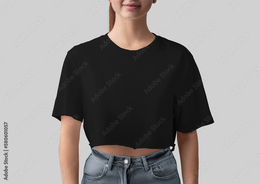Foto de Mockup of black crop top on smiling girl, blank canvas bella