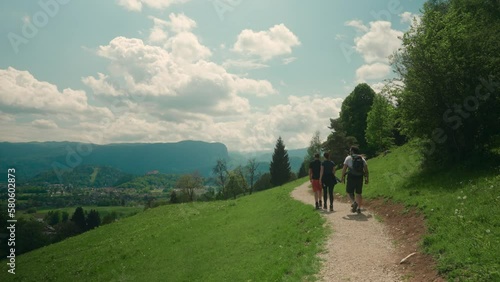 Group of friends trekking and walking in the forest. Group of people hiking 
