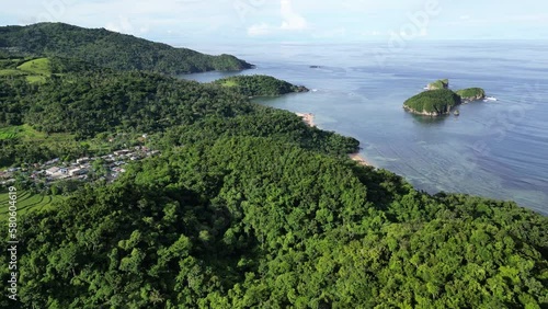 Aerial Pan of hilly tropical coastline and islands, Catanduanes, Philippines