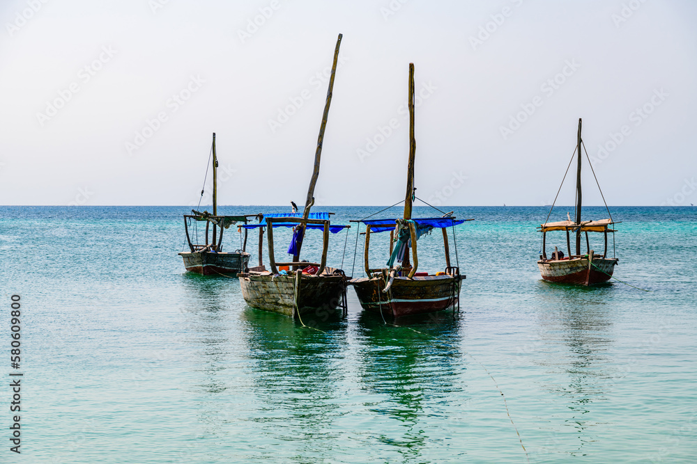 Traditional wooden fishing boats at Zanzibar island, Tanzania Traditional wooden fishing boats at Zanzibar island, Tanzania