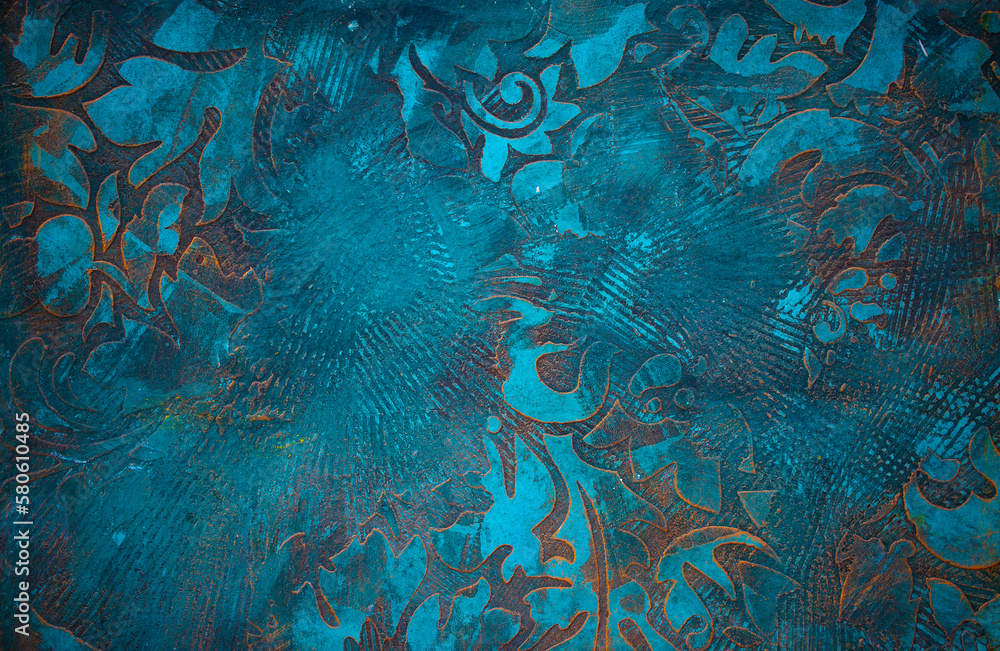 Fototapeta premium Blue background of decorative plaster with abstract spots. Unusual texture of this wall with beautiful patterns, creative surface background. Finishing coating for building cladding.