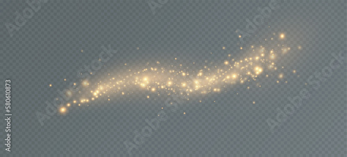 Golden sequins glow with many lights. Glittering dust. Luxurious background of golden particles.