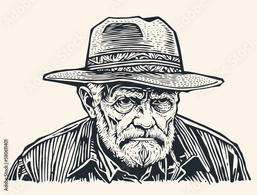 Foto An old cowboy in a hat with a gray beard and mustache, with a sad look