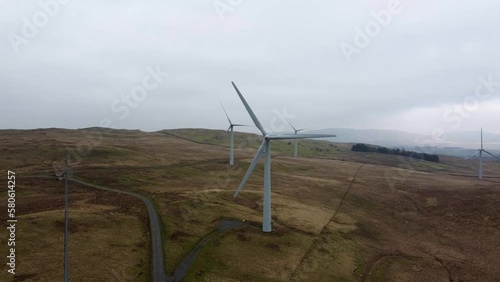 Cinematic aerial footage of Lambrigg Wind Farm, Kendal Cumbria UK. Showing wind turbines and open moorlands. photo