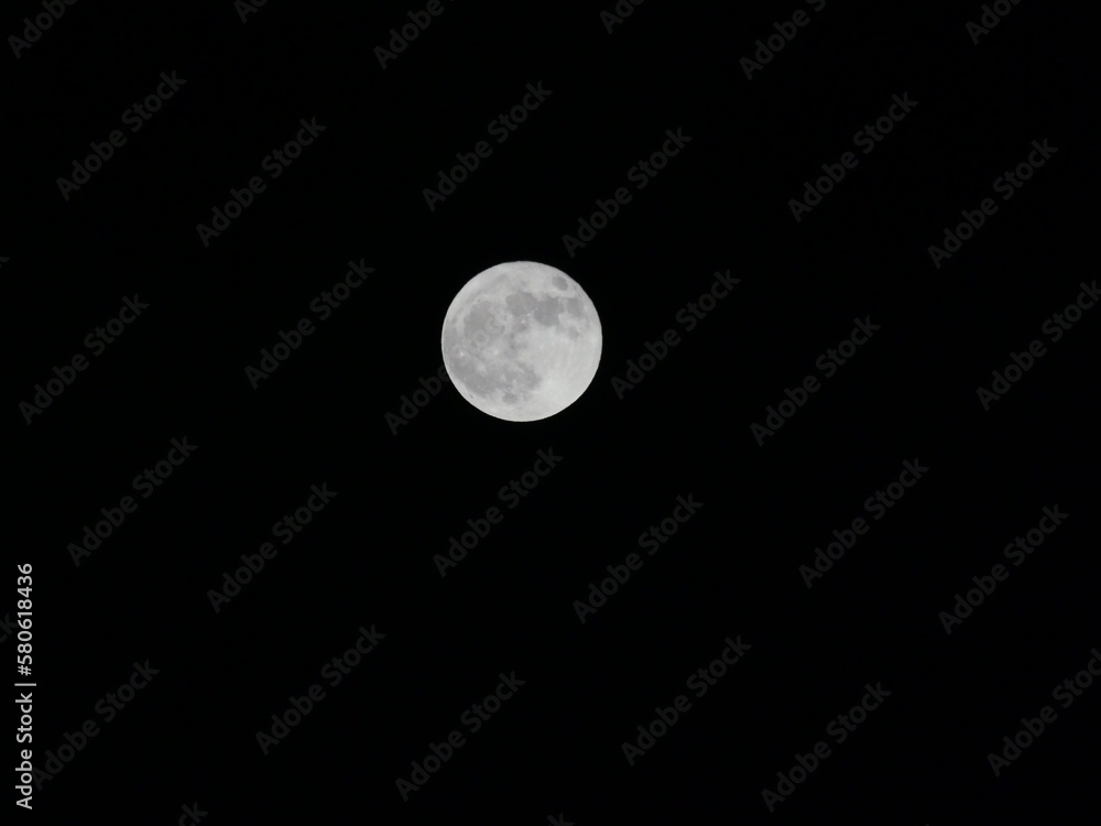 Full moon with black sky in background Full moon with black sky in background