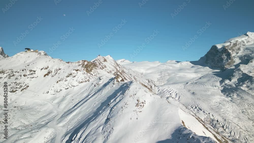 Beautiful Alpine Ridgeline in Winter with Amazing Glacier in Background Beautiful Alpine Ridgeline in Winter with Amazing Glacier in Background