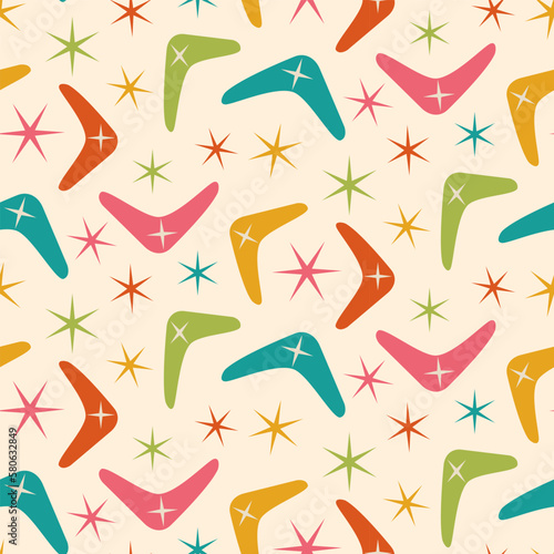 Mid Century Modern Boomerang seamless pattern with atomic retro stars in orange, teal, green, pink and yellow. For home decor, textile, wallpaper and fabric. 