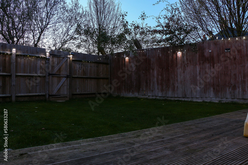 LEDs lighting up the back yard to create a magical, warm effect