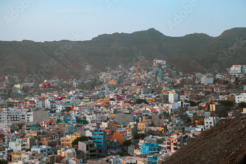 Mindelo is a vibrant port city located on the island of São Vicente in Cabo Verde. Known for its colorful colonial buildings, lively music scene, and stunning beaches, Mindelo is a destination. © David Chantre