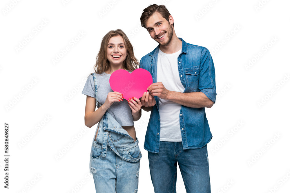 © opolja - Couple smiling at camera holding a heart on transparent background © opolja - Couple smiling at camera holding a heart on transparent background