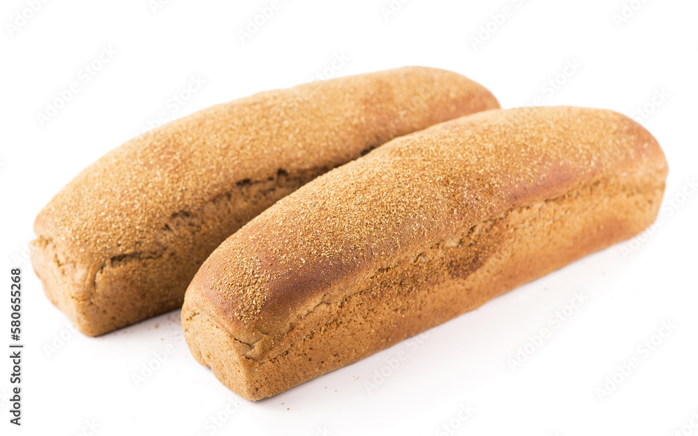 Petite sprinkling flour bread lies on a white background Petite sprinkling flour bread lies on a white background