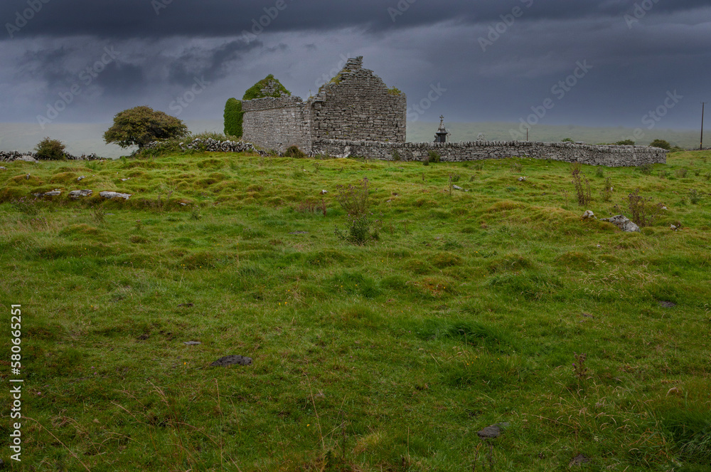 Ruin of a abandoned church with graveyard. Rainy day. Westcoast Ireland. Ring of Kerry. Ruin of a abandoned church with graveyard. Rainy day. Westcoast Ireland. Ring of Kerry.