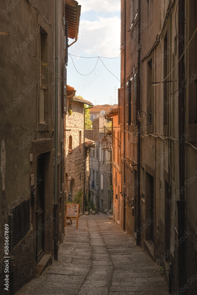 Narrow street in the town of siena, italy