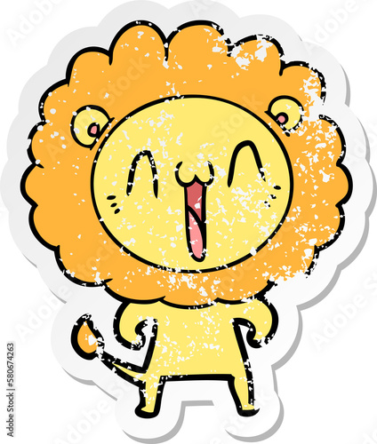 Fototapeta Naklejka Na Ścianę i Meble -  distressed sticker of a happy cartoon lion