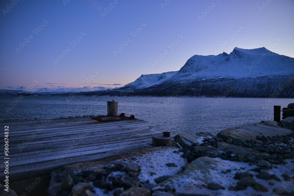 View from the island of Kvaloya, a very beautiful landscape opens up with a bridge and mountains