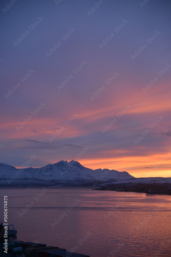Incredible sunset in winter in tromsø, norway. Very beautiful colors of the sky, just like in the movie