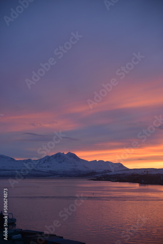 Incredible sunset in winter in tromsø, norway. Very beautiful colors of the sky, just like in the movie