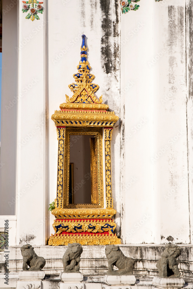 Detail of golden window ornament of Phra Mondop in Wat Pho, Bangkok
