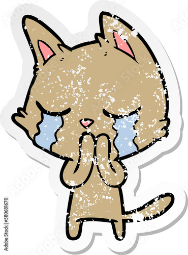 distressed sticker of a crying cartoon cat