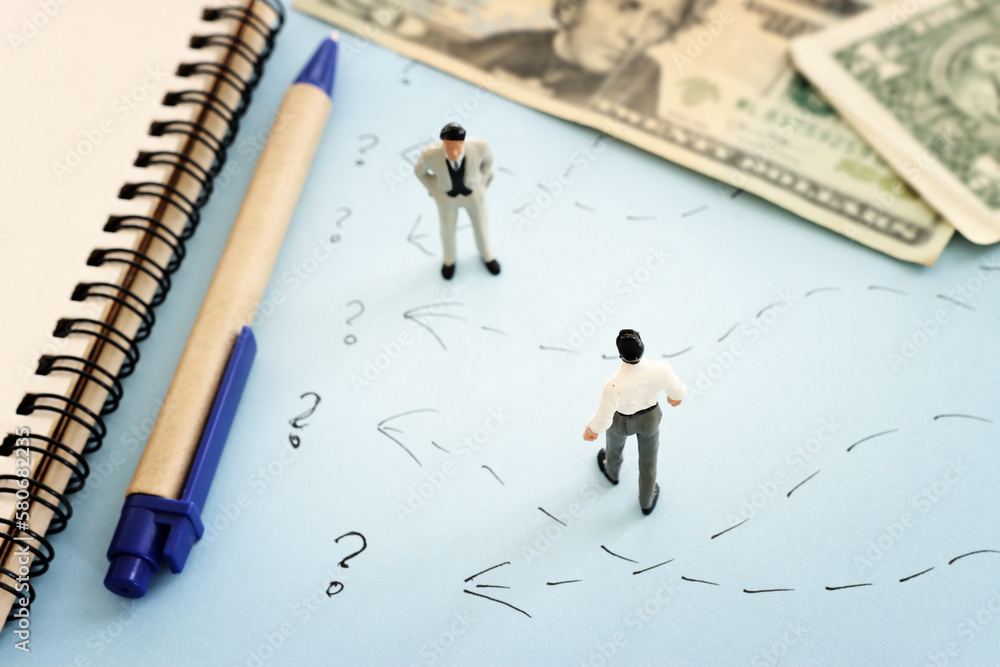 Concept image of person looking at money bills. Idea of business, finance and planning Concept image of person looking at money bills. Idea of business, finance and planning