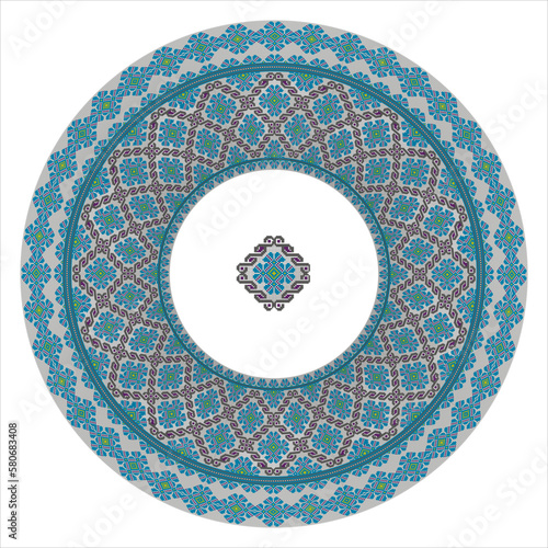 Round plate with a pixelated geometric pattern in cold colors