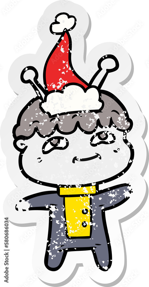 friendly distressed sticker cartoon of a spaceman wearing santa hat friendly distressed sticker cartoon of a spaceman wearing santa hat