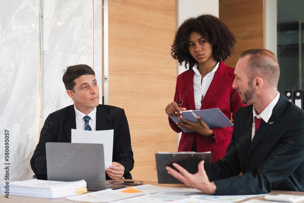 Diverse business team discussing project at corporate briefing in boardroom. colleagues meeting for brainstorming, sharing ideas, together. Teamwork concept Diverse business team discussing project at corporate briefing in boardroom. colleagues meeting for brainstorming, sharing ideas, together. Teamwork concept