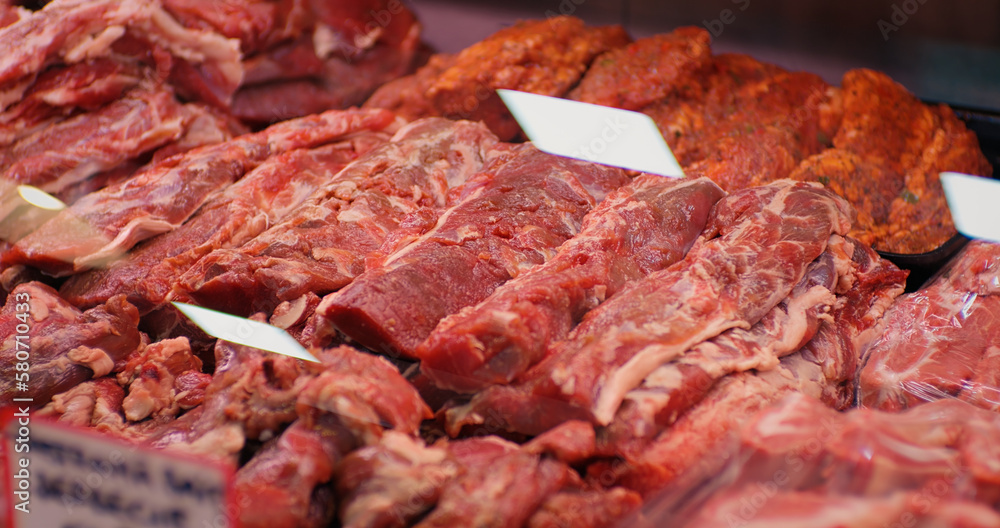 Display of assorted chopped raw lamb meat in butchers shop for sale. Fresh organic meat department in supermarket. Display of assorted chopped raw lamb meat in butchers shop for sale. Fresh organic meat department in supermarket.