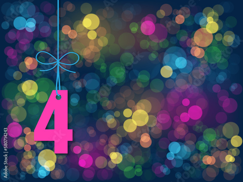 No 4 suspended by string on background of colorful bokeh lights