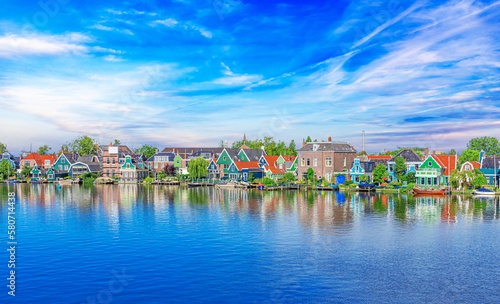 Panorama of traditional dutch houses at the Zaan river in Zaandijk, Netherlands.