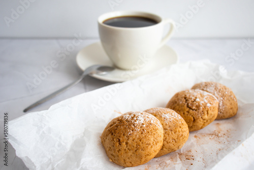  Photo of oatmeal cookies, cookies, cinnamon, black coffee. on a white table
