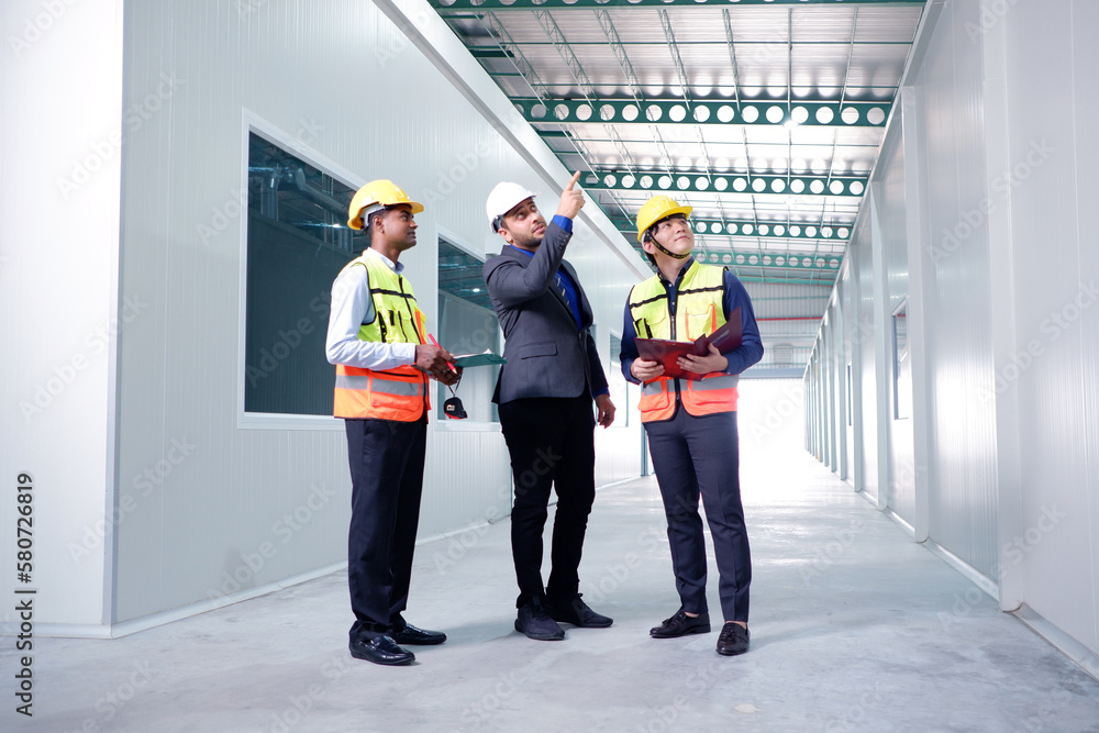 Obraz premium Warehouse engineering and factory inspectors industry concept.