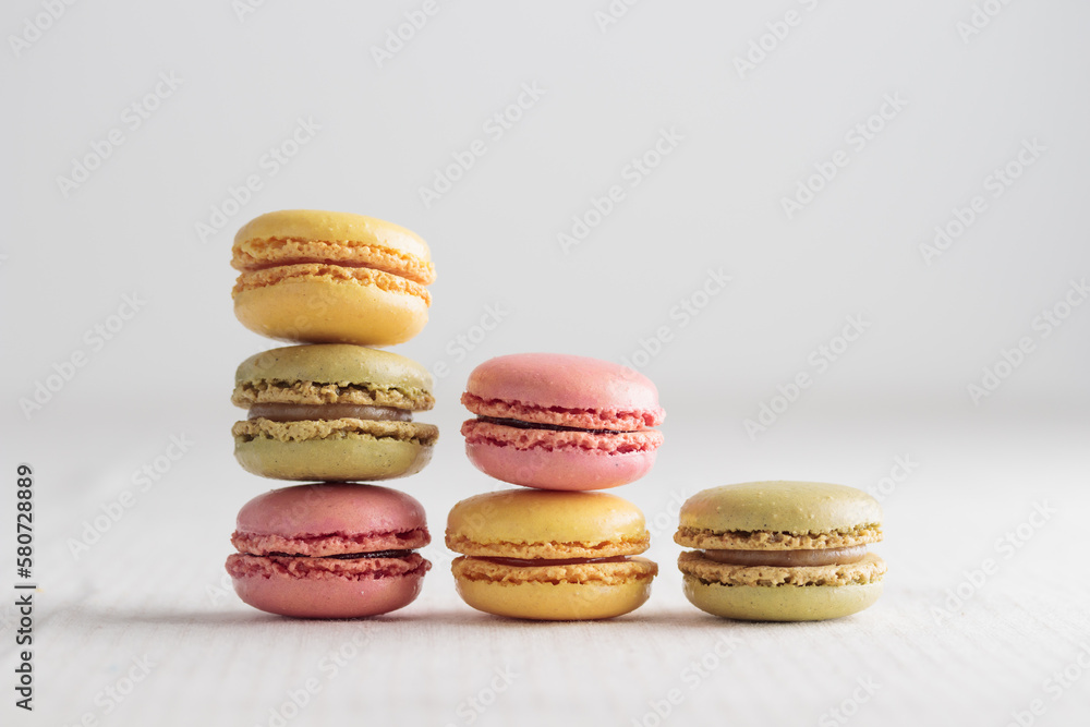Colorful pastel eco handmade natural macaroons on white background. Gift for 8 March, International Women's Day, Valentine Day Colorful pastel eco handmade natural macaroons on white background. Gift for 8 March, International Women's Day, Valentine Day