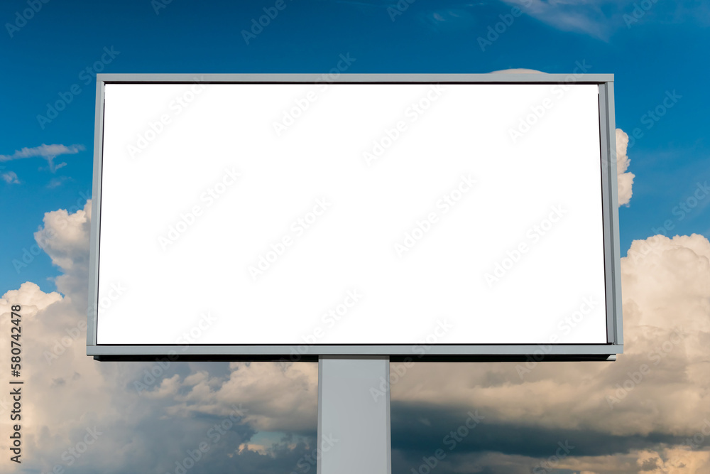 Front view: blank horizontal white billboard against blue sky with warm sunset clouds - mock up. Consumerism, advertising, white screen, template, mockup and copy space concept Front view: blank horizontal white billboard against blue sky with warm sunset clouds - mock up. Consumerism, advertising, white screen, template, mockup and copy space concept