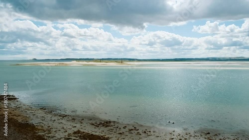 Establishing shot of the Holy Island of Lindisfarne in Northumberland, England, UK, with recorded history dating back to 6th century AD photo