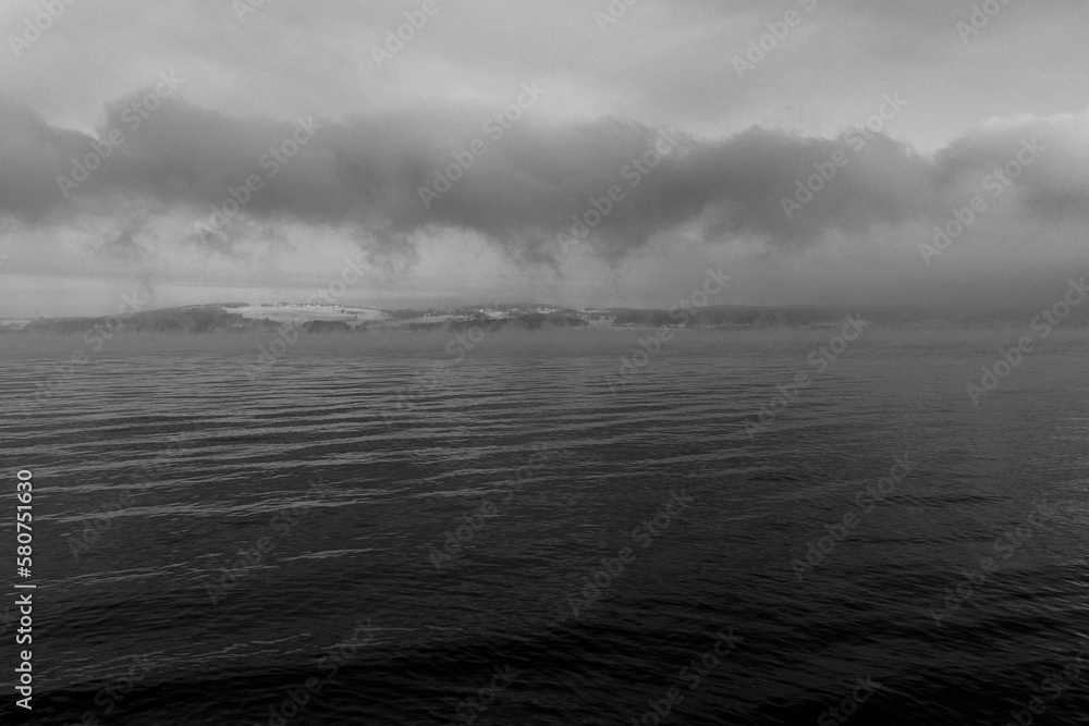 Fototapeta premium Calm vawes on Lake Mjøsa in winter.